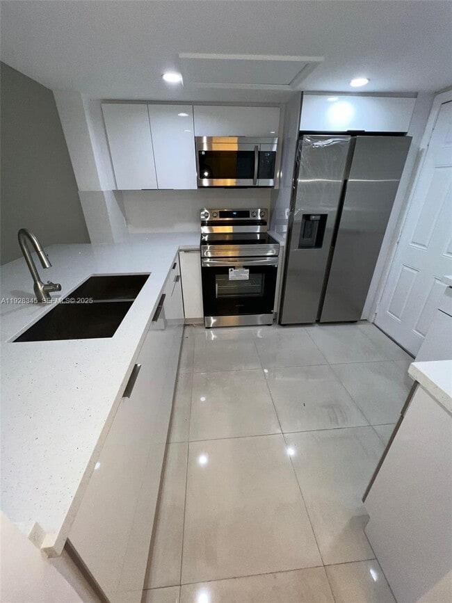 Building Photo - 2810 NE 201st Terrace Unit G107