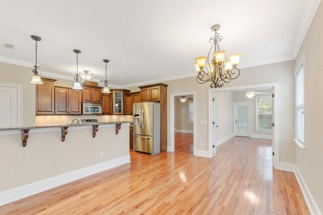 Photo - Captivating 3 bedroom house available for rent, wood floors, garage, screened porch renting for $...