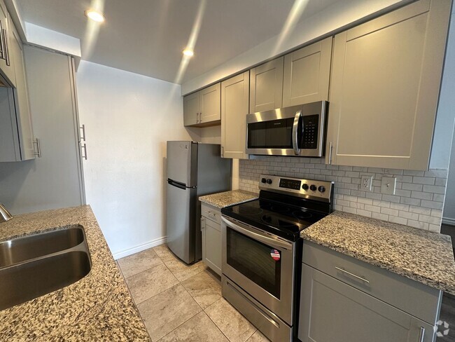 Building Photo - Charming Two-Bedroom Condo in Montebello w... Unit 208