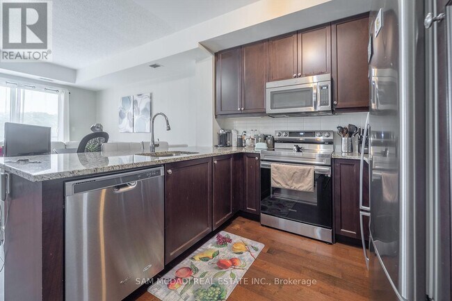 Photo - 3170 Erin Mills Pkwy Unité 234