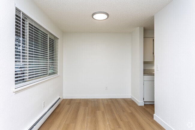 2BR, 1BA - 720SF - Dining Room - Timberwood Court