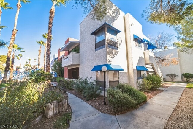 Building Photo - 2649 Red Rock St Unit 101
