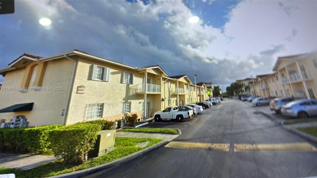 Building Photo - 6922 NW 179th St Unit 103-5