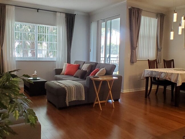 Living room and dinning area - 3245 NE 184th St Unit #13312