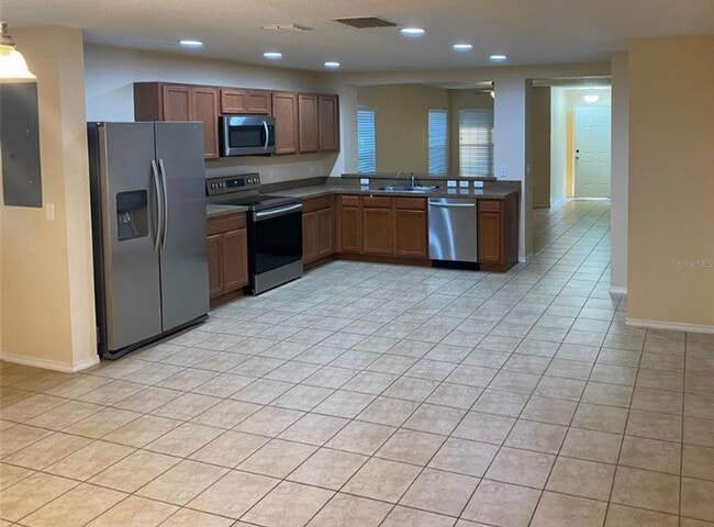 Photo - 3 BR/2.5BA | Newly Renovated Single Family Home | Private Rear Patio | Community Pool | In Compas...