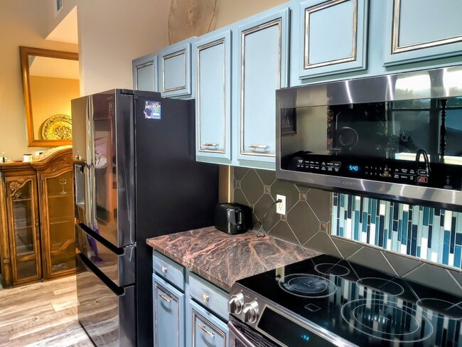 Kitchen, family hub refrigerator - 15475 Andrews Dr Unit 304 Town Square Lofts DIA