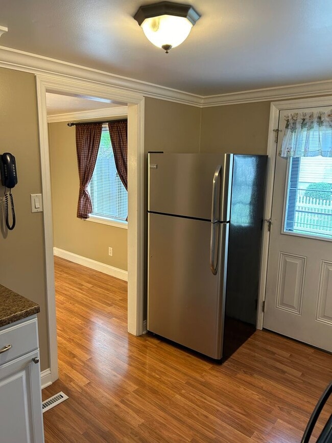 Photo - Modern Charm: 2 BR Home with Finished Basement, Pet Friendly, Assigned Parking, and Prime Location!