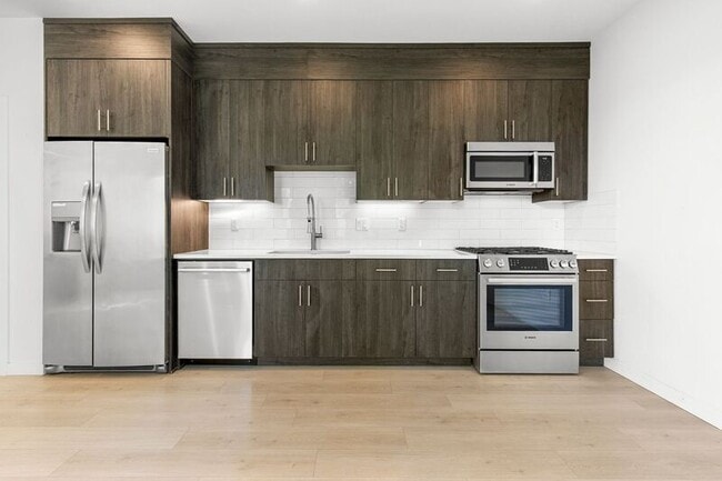 Building Photo - 3975 NE Garfield Ave. Unit #8 Rental