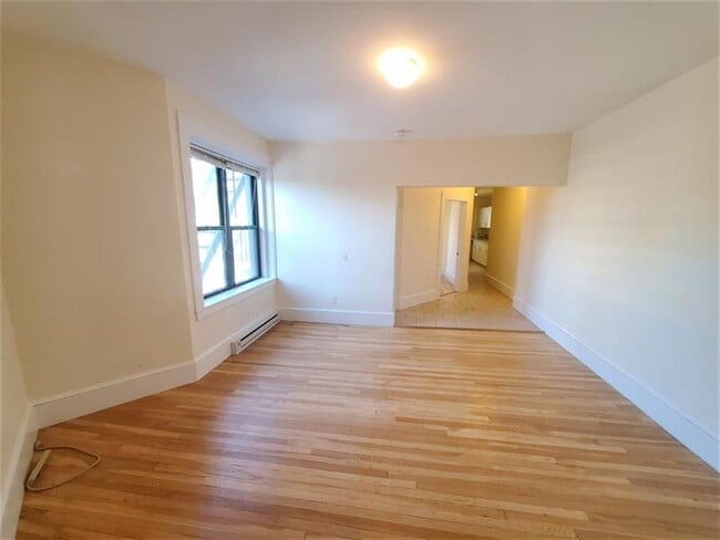 Building Photo - 931 Massachusetts Ave Unit 5