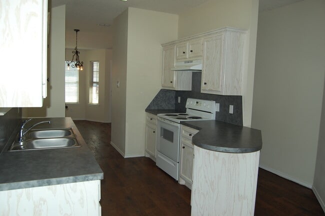 Photo - Stylish 3/2/2 Home with Fireplace and Cove...