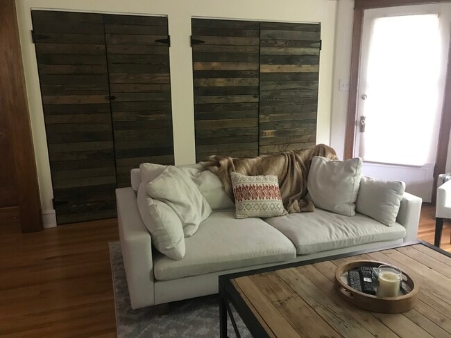 Giant closets with custom reclaimed wood doors - 3654 N Janssen Ave Unit 2