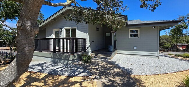 Photo - large custom home with peek a boo ocean views