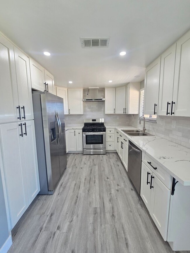 Photo - Fully Renovated 3 Bedroom & 2 bathroom Home with Huge Backyard – California City!