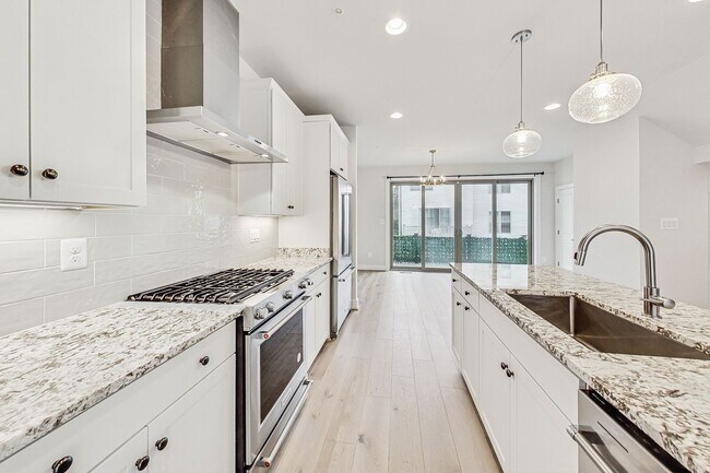 Photo - Contemporary 4 bedroom, 3.5 bath Open Concept Townhome!