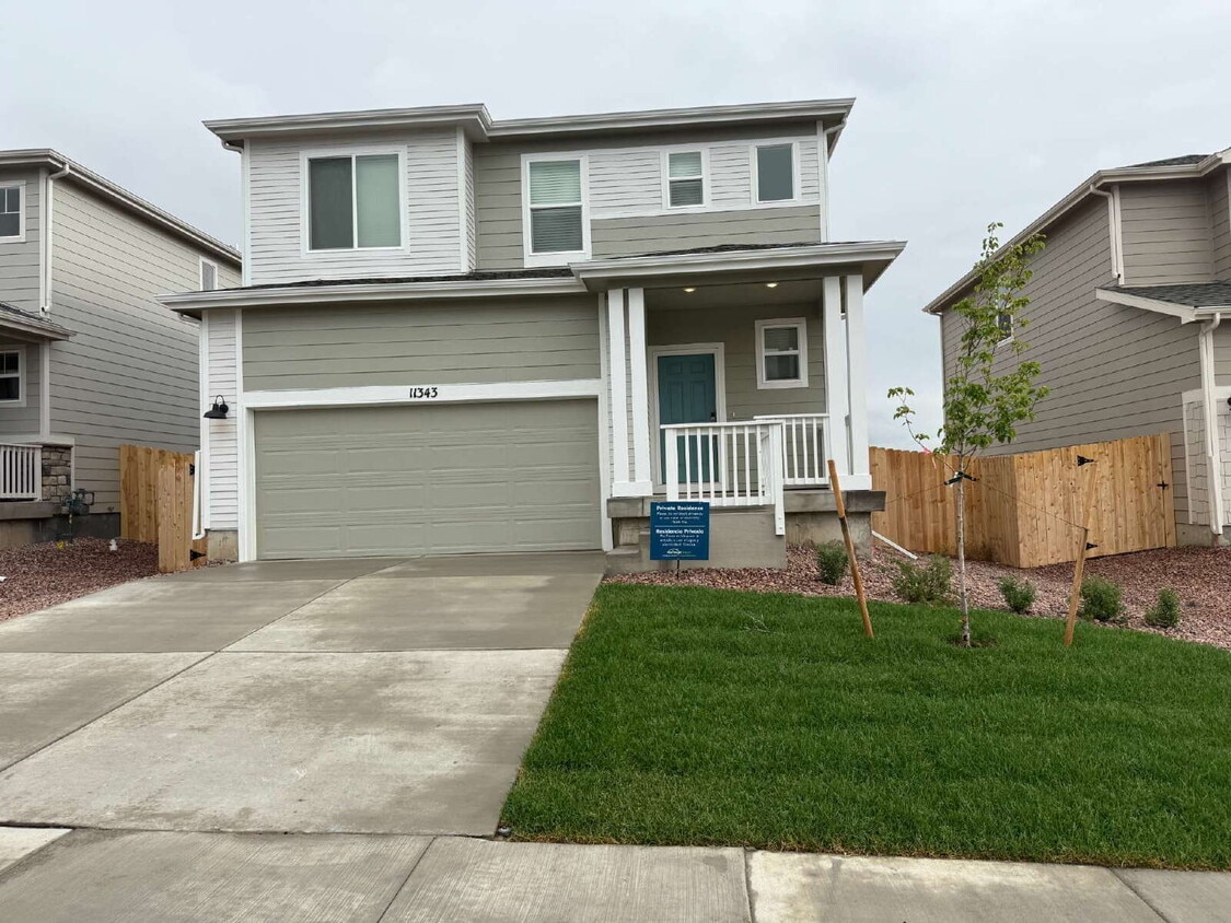 Photo - "Charming 3-Bed Sanctuary with 2 Full Baths at 11343 Pikeminnow Pl, Colorado Springs!"