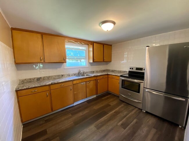 Photo - Cozy Silvis Home With Huge Fenced Yard and Attached Garage!