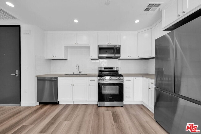 Photo - 667 Wilton Pl Unit 207