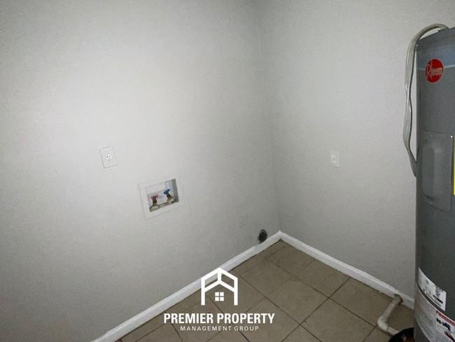 Photo - Spacious 4BR Family Home in Raleigh | Modern Tile Floors & Spacious Backyard