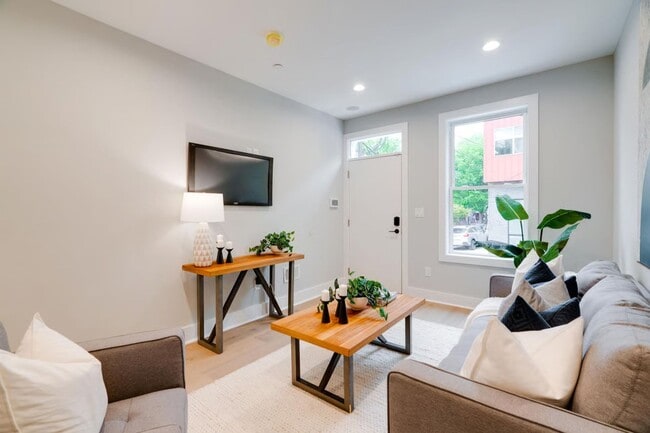 Photo - Spacious 3BR Home with Finished Basement & Roof Deck