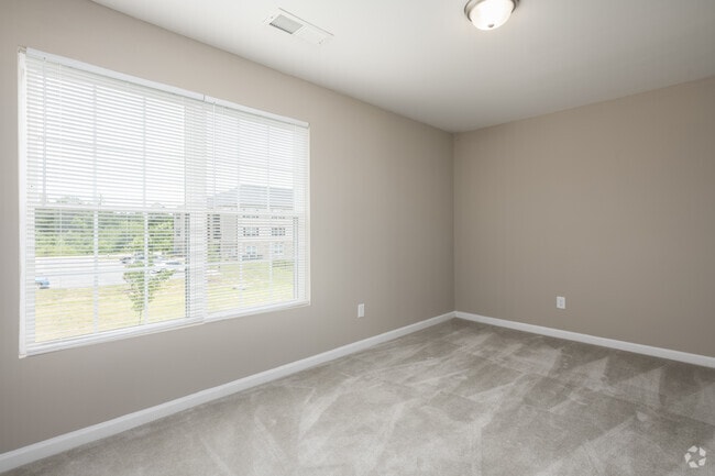 2BR, 2BA - 1,124SF - Primary Bedroom