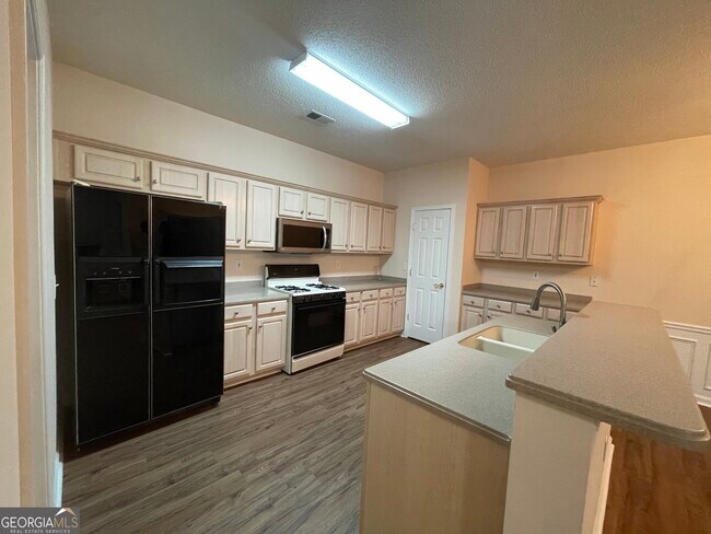 Photo - 124 Cottesford Dr SW Unit # 11