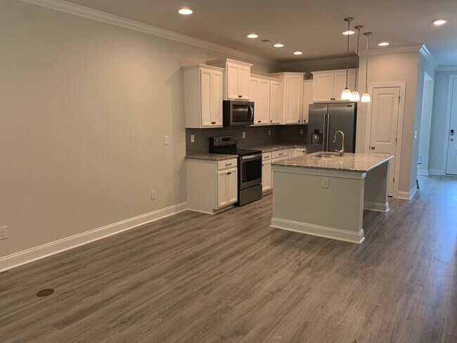 Photo - 4 Bedroom, 2.5 Bath, Pet Friendly Town Home with Garage Within Barefoot Resort and Golf! Availabl...