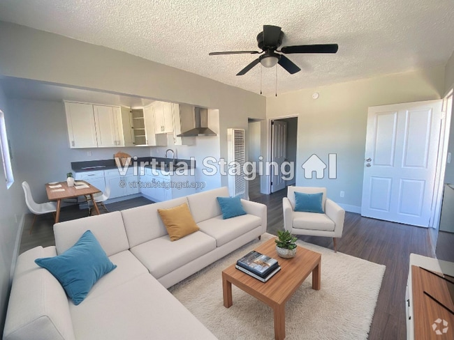 Building Photo - 7406 S Hoover St Rental