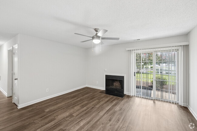 Laurel with Fireplace - 2BR, 2BA - 922SF - Living Room - The Oaks of Dunlop Farms