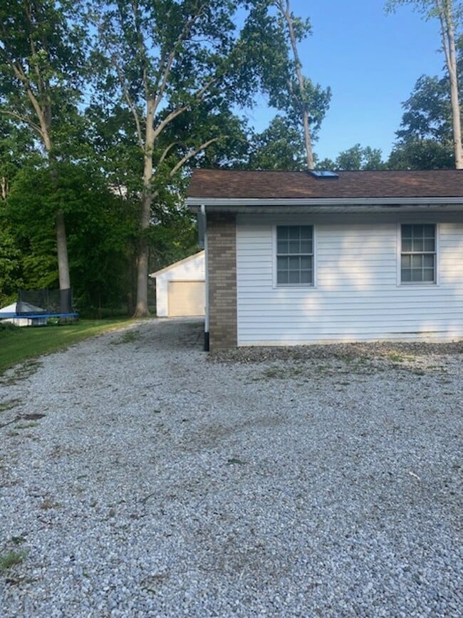 Photo - Ranch home with two car garage located on over 1/2 acre