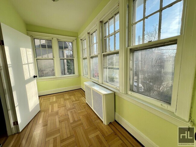 Photo - 3.5BR 2BA Massive Townhouse w/ Sunroom & Optional Private Parking In Maspeth Unit 2