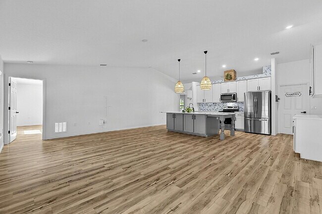 Modern 4-Bedroom, 3-Bath Home with Private In-Law Suite – Palm Coast, FL