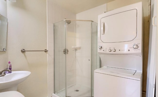 Washer and dryer have been replaced from white to black. - 4571 S Hannibal St Unit 28