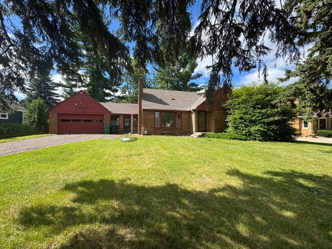 Building Photo - 3BR/1BA in Roseville Featuring A Sprawling Fenced Yard & An Attached Garage