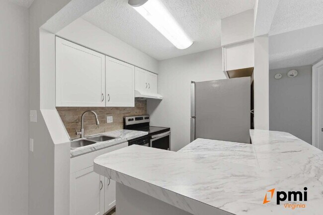 Photo - GATED COMMUNITY FULLY RENOVATED 1 BED 1 BATH WITH BALCONY AND POOL