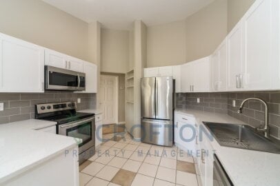 Photo - Move-In Ready 3BR/2BA with Brand-New Kitchen, Fireplace & Fenced Yard!