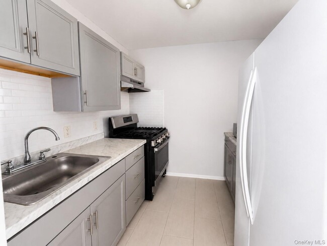 Photo - 42-16 Rockaway Beach Blvd Unit 1st Fl