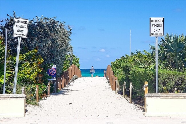 Building Photo - 8430 Harding Ave Unit 8