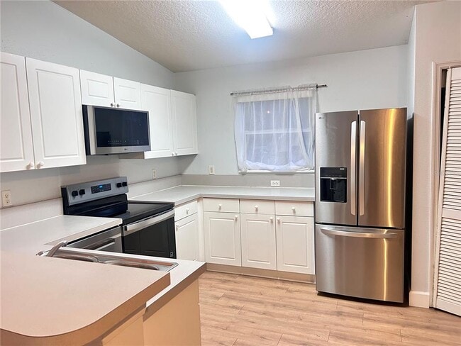 Photo - 8825 Grand Palms Cir Unit B