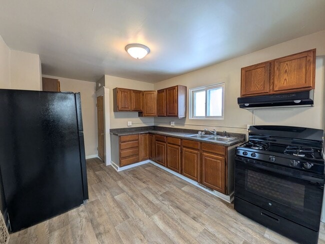 Photo - Large 4 Bedroom Home with Garage, Deck, & Fence!