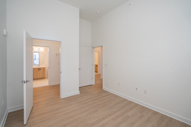 B1 Primary Bedroom - Wrighthaven Square Apartments