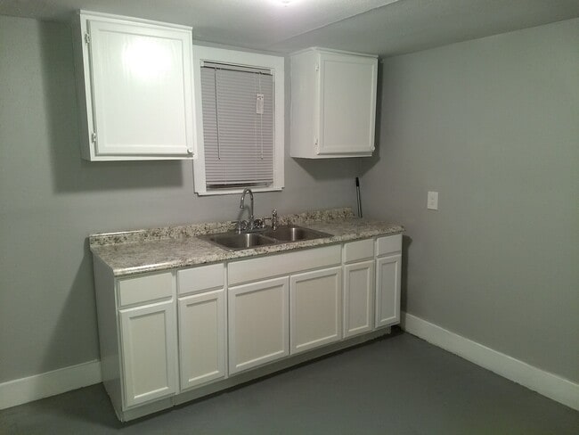 Building Photo - 5902 Downing St. Unit A