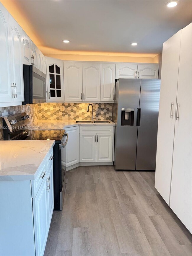 Building Photo - 14185 SW 87th St Unit 212A