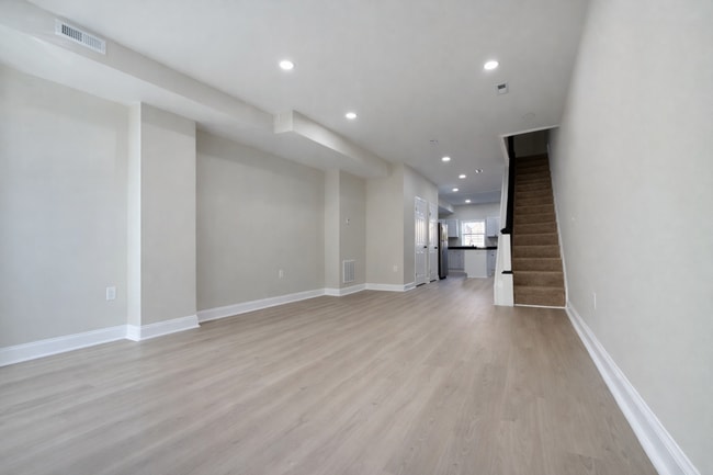 Photo - Modern 3BR Rowhome with Finished Lower Level & Rear Deck