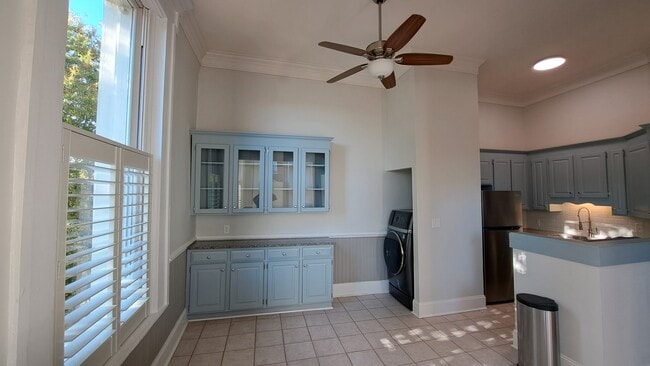 Dining room, laundry, and kitchen viewed from Living Room - 101 E Broad St Unit Apt. A