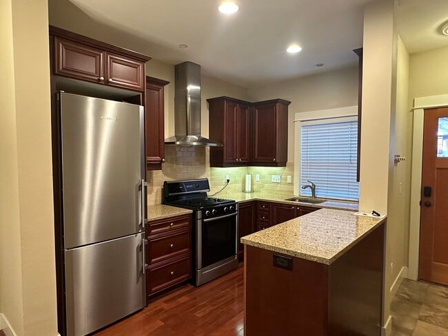 Photo - Stunning Tri-Level Condo with Open Concept Layout, Loft, and Private Patio!