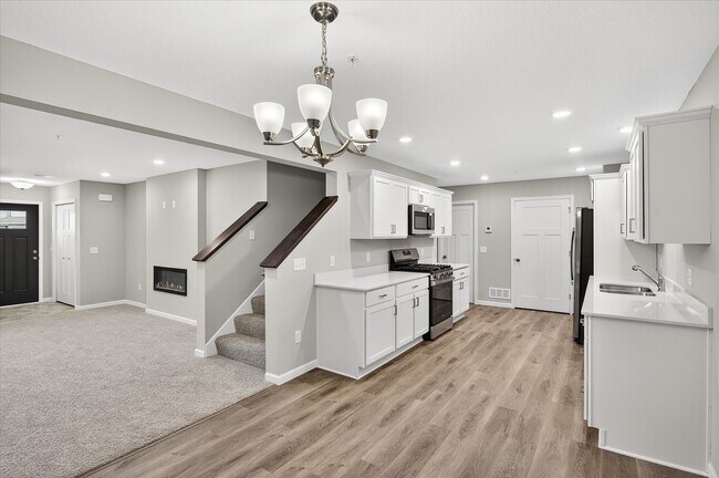 Photo - New construction interior-unit townhome in...