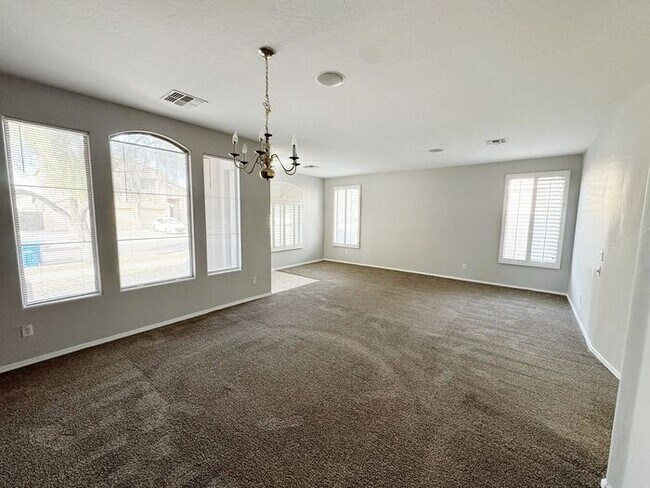 Photo - Single-level 4 bed, 2 bath home with tandem 3-car garage and RV gate.
