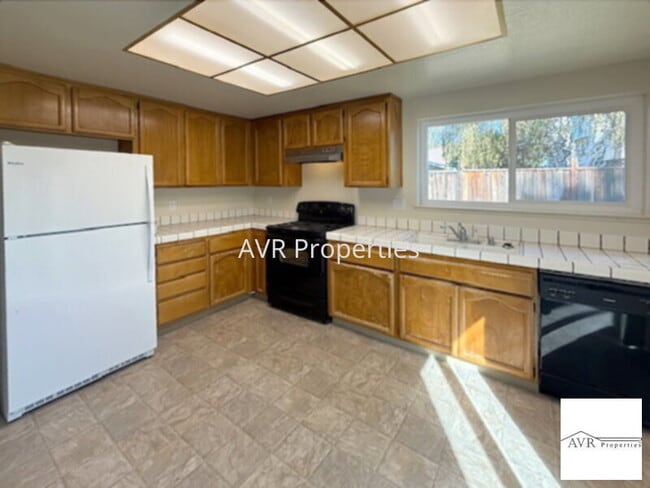 Photo - Gorgeous backyard with new carpets and paint