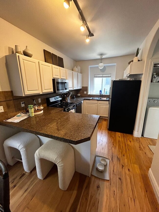 Photo - Charming 3-Bedroom home with 2 car garage in Prime Location