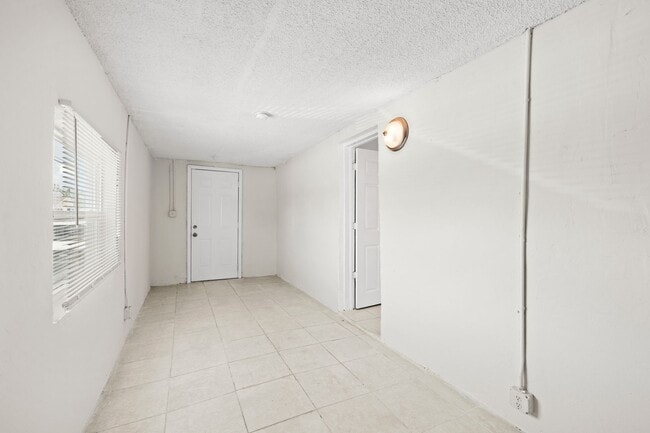 Photo - 1125 W 28th St Unit A FRONT SINGLE FAMILY HOUSE